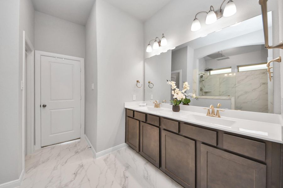 Primary spa like bathroom view.