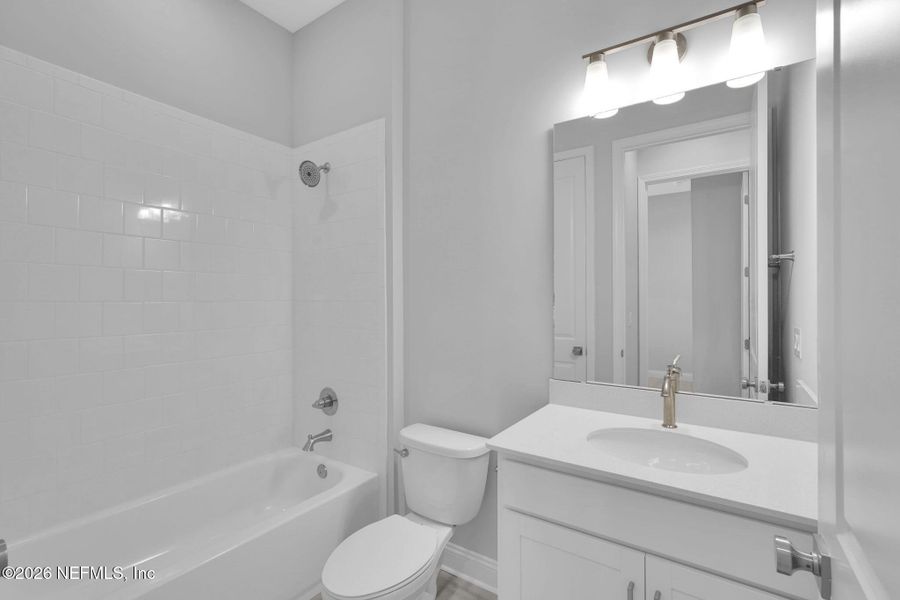 Furnished interior view inside a new home in Amelia National Country Club, Fernandina Beach (Image 5).