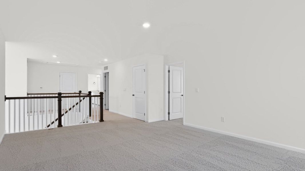 Spacious, unfurnished interior of a new home in The Grove at Winston Pointe, Clayton (Image 19).