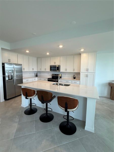 Furnished interior view inside a new home in , Ave Maria (Image 2).
