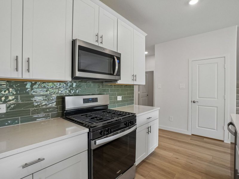 Furnished interior view inside a new home in Parks at Foster Crossing - Signature Series, Anna (Image 7).