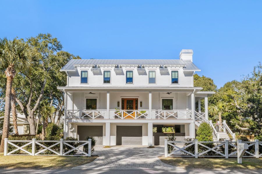 Front exterior of a new home in , Sullivan's Island, SC, highlighting curb appeal (Image 2). Front exterior of a new home in , Sullivan's Island, SC, highlighting curb appeal (Image 2).