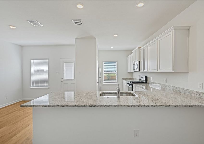 The kitchen and adjoining dining room