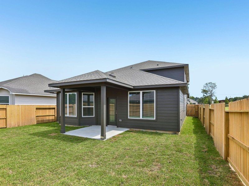 Exterior details and patio area of a home in Granger Pointe - Premier Series, Conroe (Image 26).