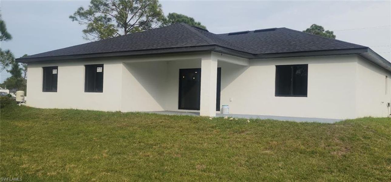 Exterior details and patio area of a home in , Lehigh Acres (Image 3).