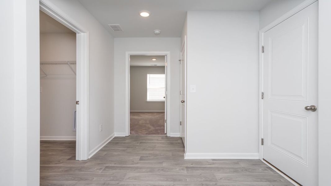 Representative unfurnished interior of a home built from the CALI by D.R. Horton in Jordanville Farms, Galivants Ferry (Image 21).