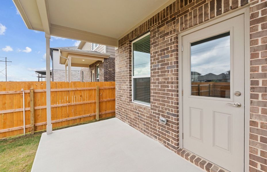 Exterior details and patio area of a home in Crosswinds, Kyle (Image 4).