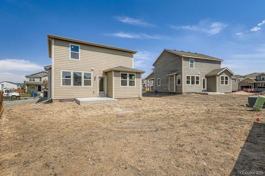 Exterior details and patio area of a home in Buffalo Highlands – Commerce City, Commerce City (Image 19).