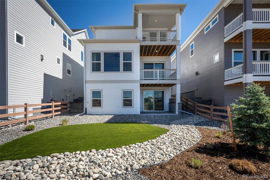 Exterior details and patio area of a home in Revel Crossing at Wolf Ranch - The Panorama Collection, Colorado Springs (Image 27).