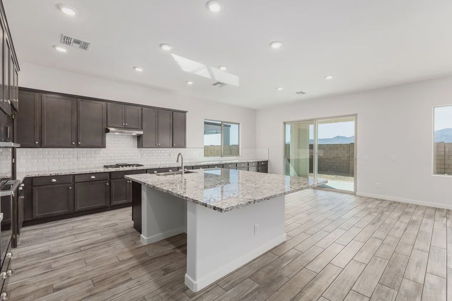 Furnished interior view inside a new home in Valencia at Granite Vista, Waddell (Image 5).