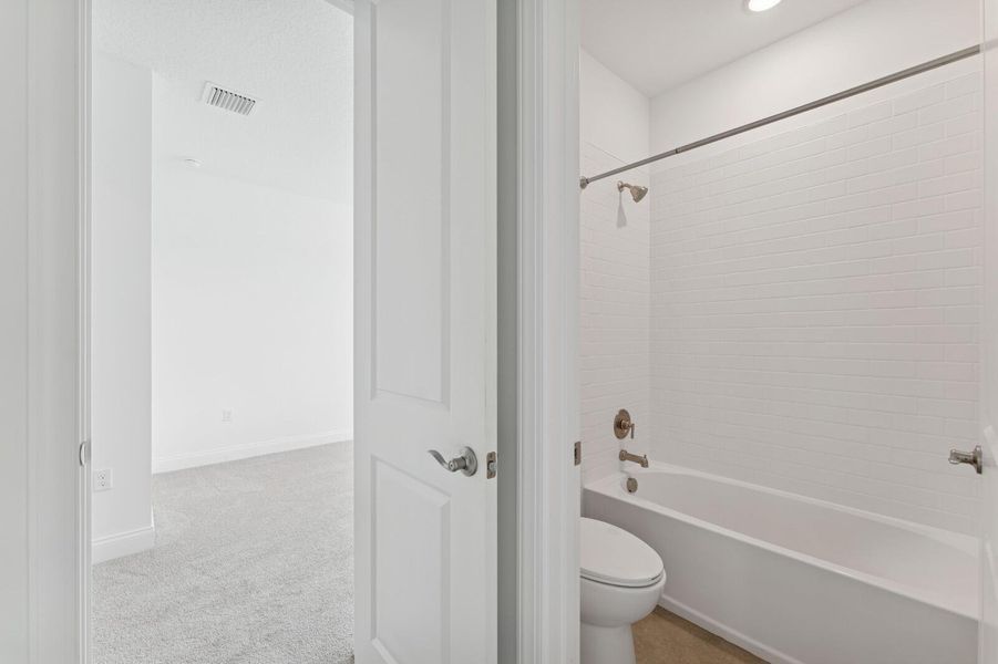 Furnished interior view inside a new home in Salerno Reserve - Single Family, Stuart (Image 16).