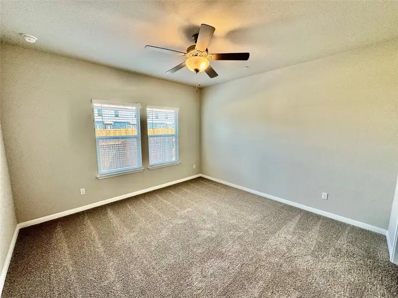 Spacious, unfurnished interior of a new home in Waterstone Village, Kyle (Image 11).