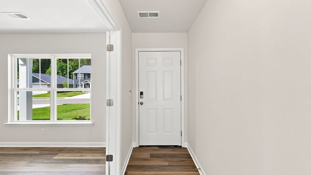 Spacious, unfurnished interior of a new home in Bentley Park, Greenwood (Image 14).