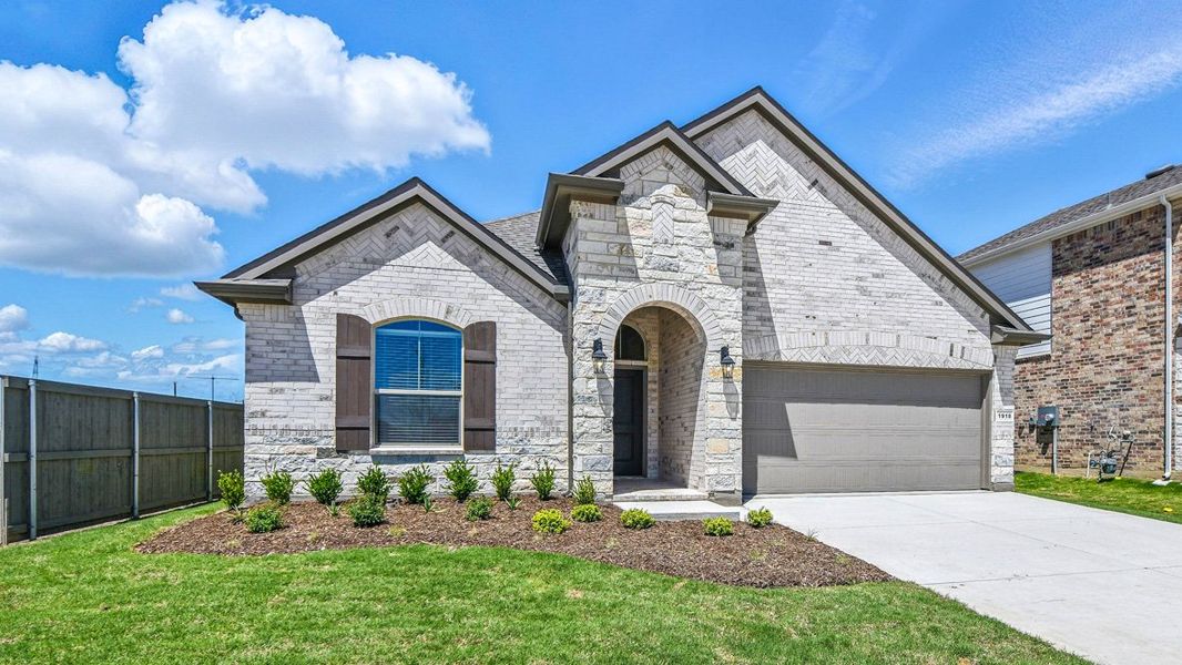 Representative exterior photo of a completed home built from the AVERY by D.R. Horton in Pecan Square, Northlake, TX (Image 1). Representative exterior photo of a completed home built from the AVERY by D.R. Horton in Pecan Square, Northlake, TX (Image 1).
