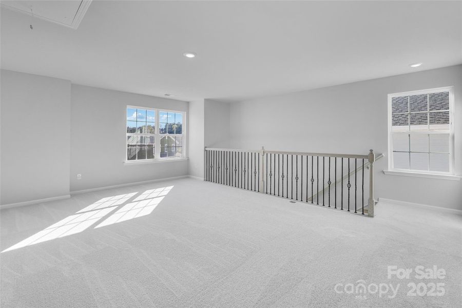Spacious, unfurnished interior of a new home in Redhawk: Walk, Belmont (Image 26).