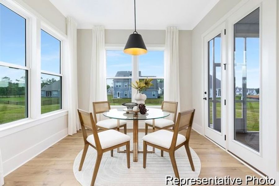 Representative furnished interior of a home built from the Bedford P by True Homes in Homecoming, Ravenel (Image 7).