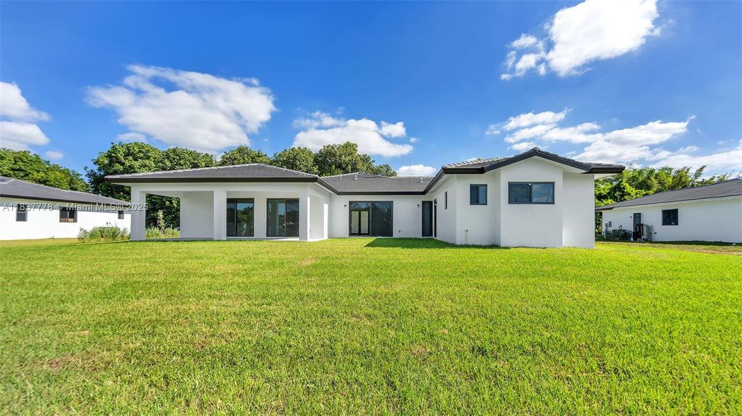 Front exterior of a new home in , Miami, FL, highlighting curb appeal (Image 21). Front exterior of a new home in , Miami, FL, highlighting curb appeal (Image 21).