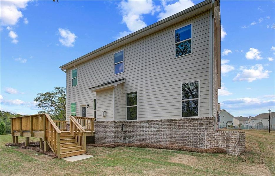 Front exterior of a new home in Cooper Park, McDonough, GA, highlighting curb appeal (Image 14).