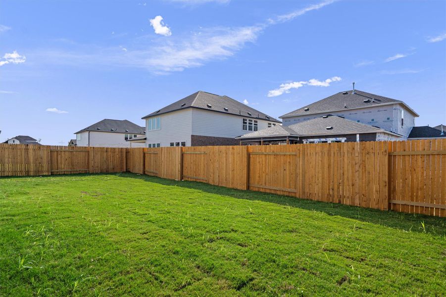 Front exterior of a new home in , Pflugerville, TX, highlighting curb appeal (Image 17).
