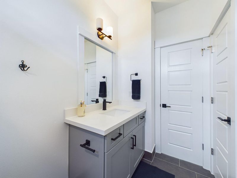 MOVE-IN READY! Full secondary bathroom with tub & shower head. FINISHES & FLOOR PLANS WILL VARY!