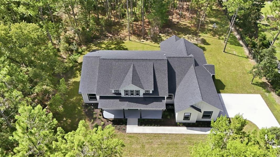 Front exterior of a new home in , Wildwood, FL, highlighting curb appeal (Image 26).
