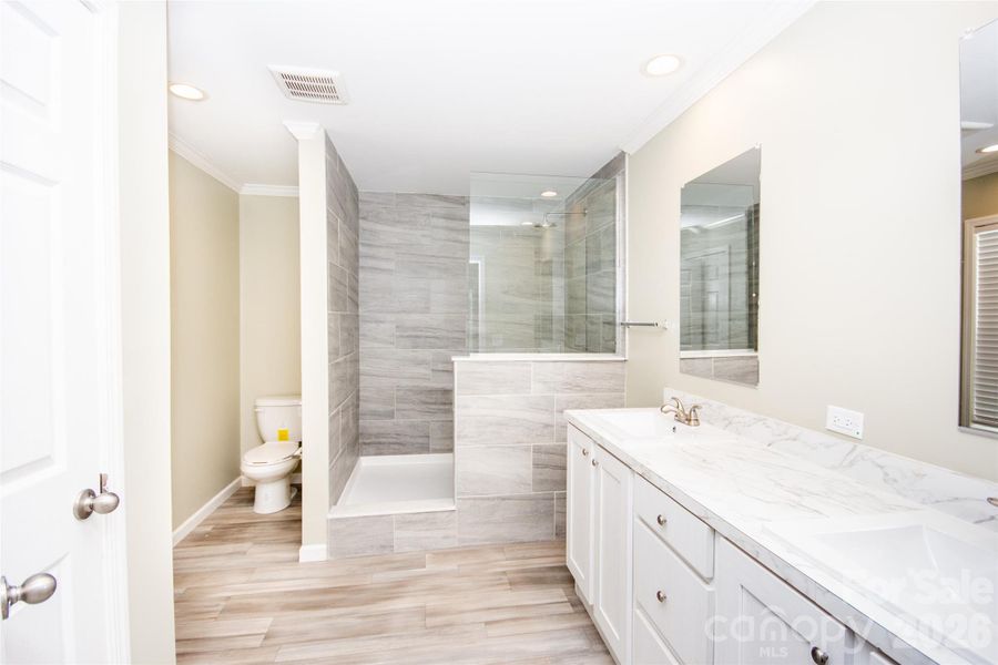 Primary Bath with Dual Vanities, not to mention that shower!