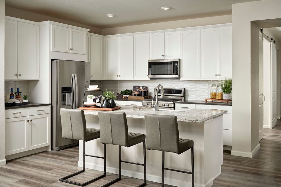 Representative furnished interior of a home built from the 4031 by Tri Pointe Homes in Reunion, Commerce City (Image 3).