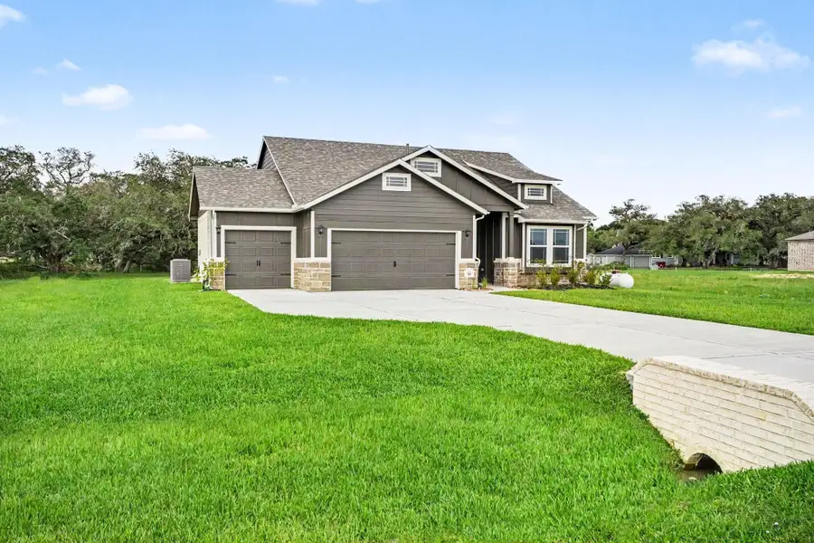 Front exterior of a new home in , Bay City, TX, highlighting curb appeal (Image 20). Front exterior of a new home in , Bay City, TX, highlighting curb appeal (Image 20).