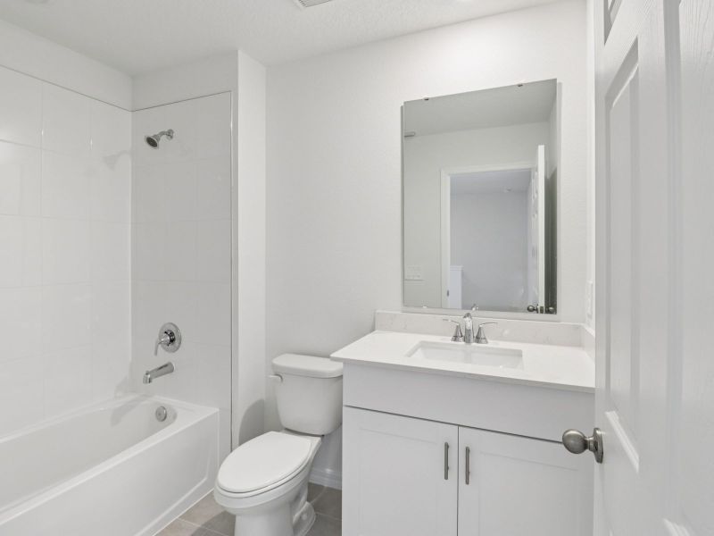Furnished interior view inside a new home in Cagan Crossings West, Clermont (Image 6).