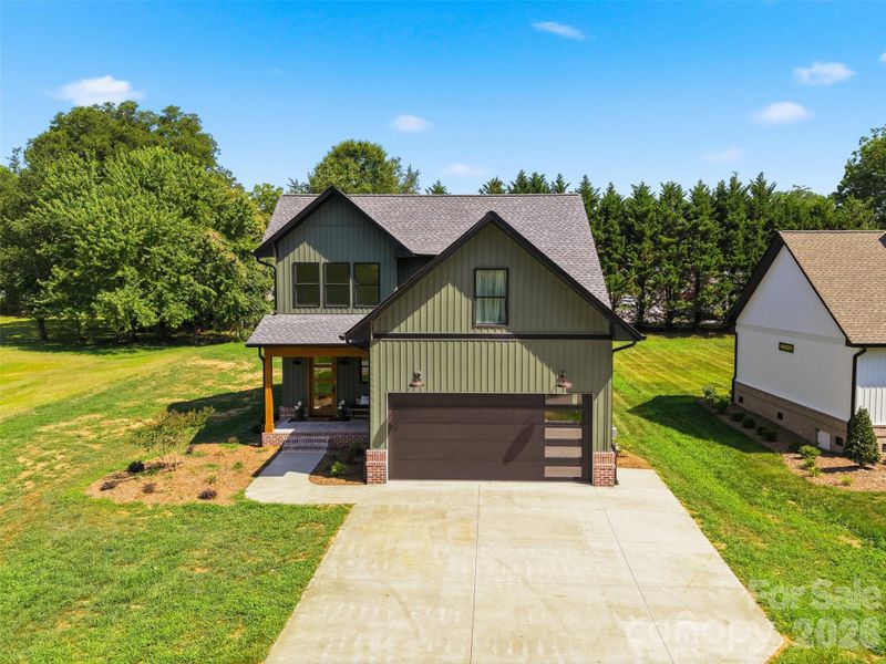 Front exterior of a new home in , Taylorsville, NC, highlighting curb appeal (Image 28). Front exterior of a new home in , Taylorsville, NC, highlighting curb appeal (Image 28).