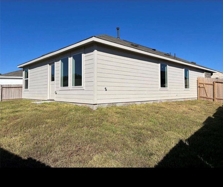 Exterior details and patio area of a home in Meadow Park, Conroe (Image 3). Exterior details and patio area of a home in Meadow Park, Conroe (Image 3).