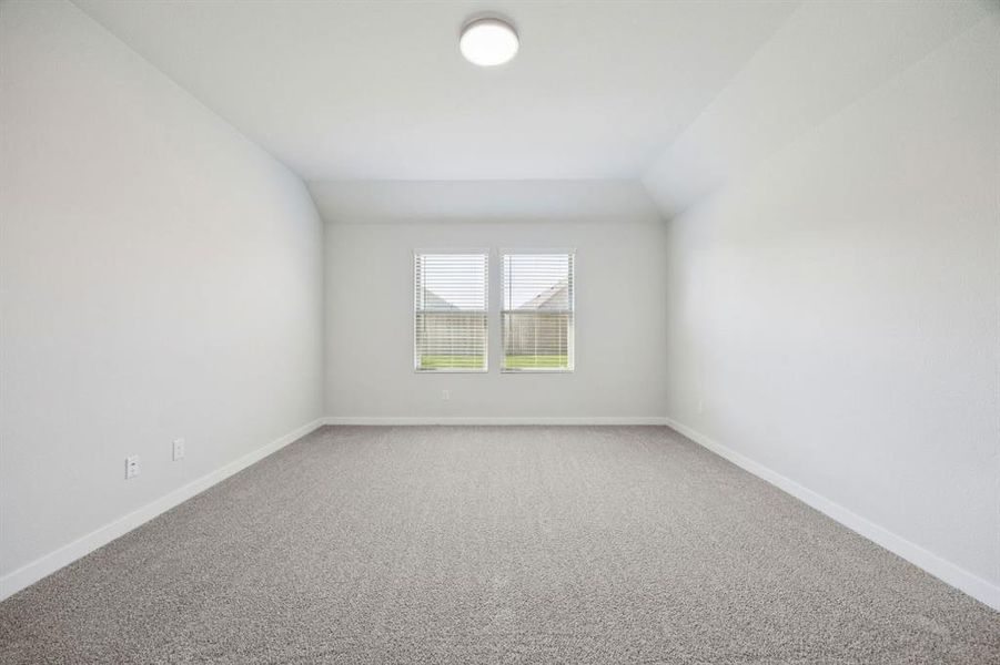 Primary Suite in the Heisman home plan by Trophy Signature Homes – REPRESENTATIVE PHOTO