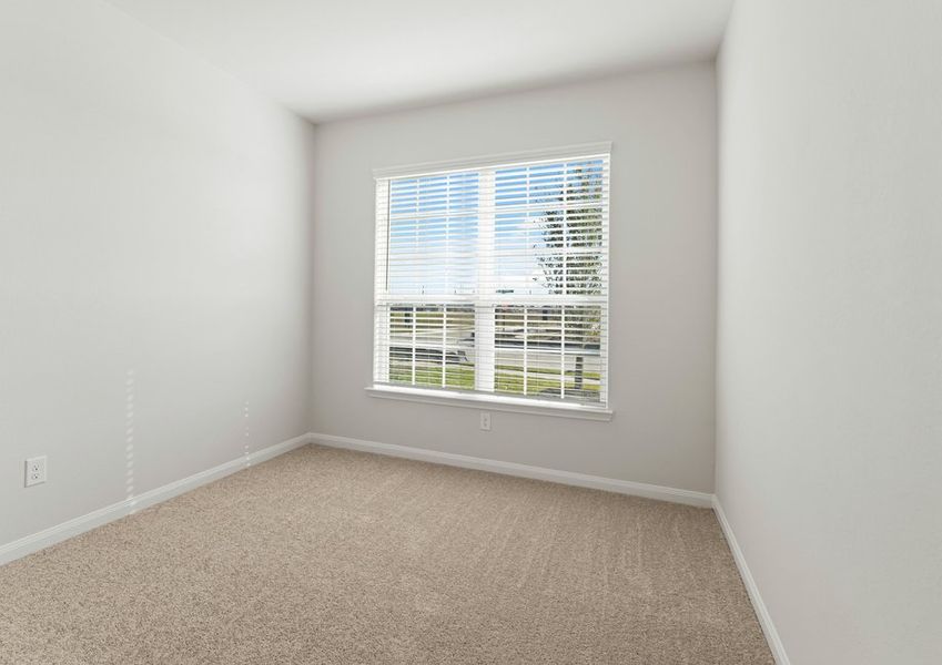 Large third bedroom with a view of the front yard Large third bedroom with a view of the front yard