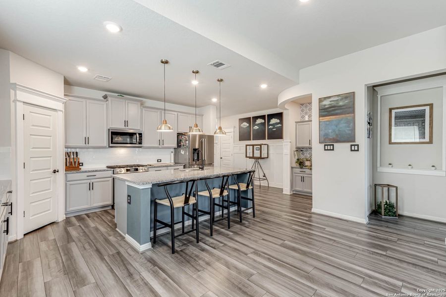 Furnished interior view inside a new home in Prescott Oaks, San Antonio (Image 8).