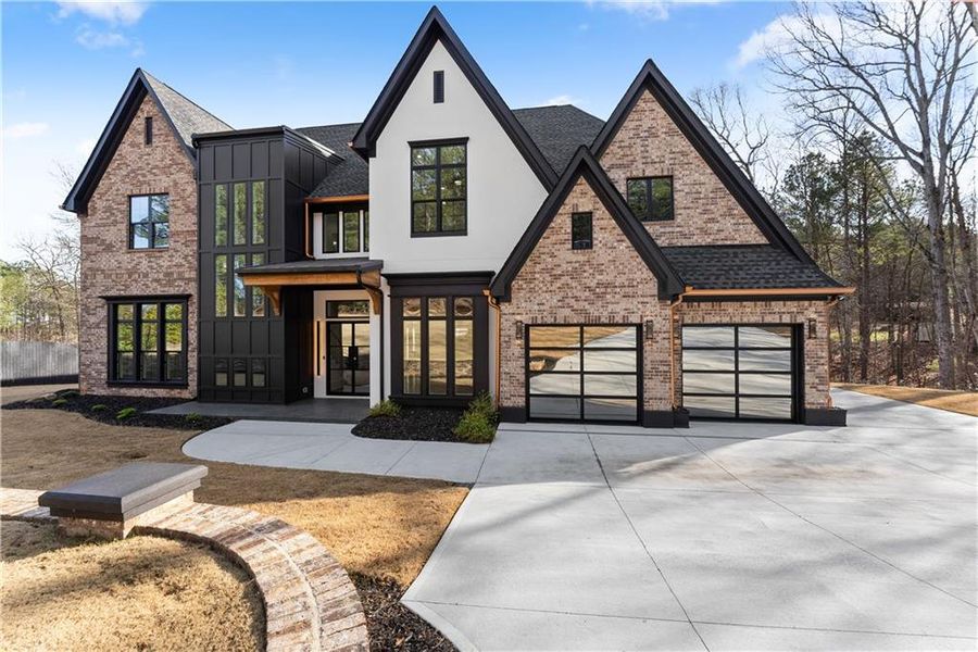 Front exterior of a new home in , Loganville, GA, highlighting curb appeal (Image 34). Front exterior of a new home in , Loganville, GA, highlighting curb appeal (Image 34).