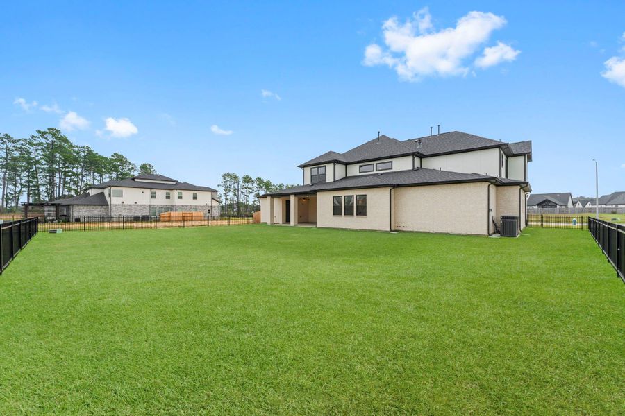 Exterior details and patio area of a home in , Tomball (Image 24).