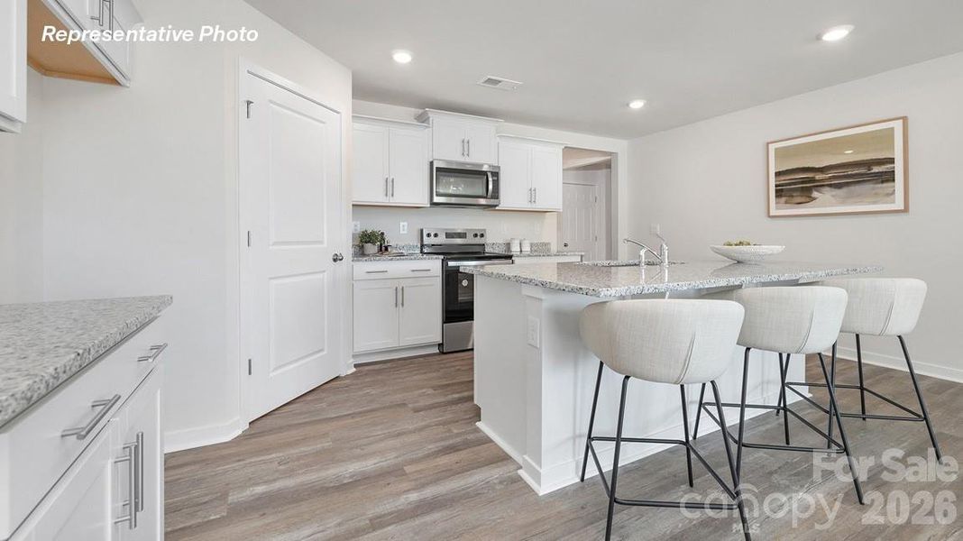 Furnished interior view inside a new home in Reedy Creek Preserve, Charlotte (Image 9).