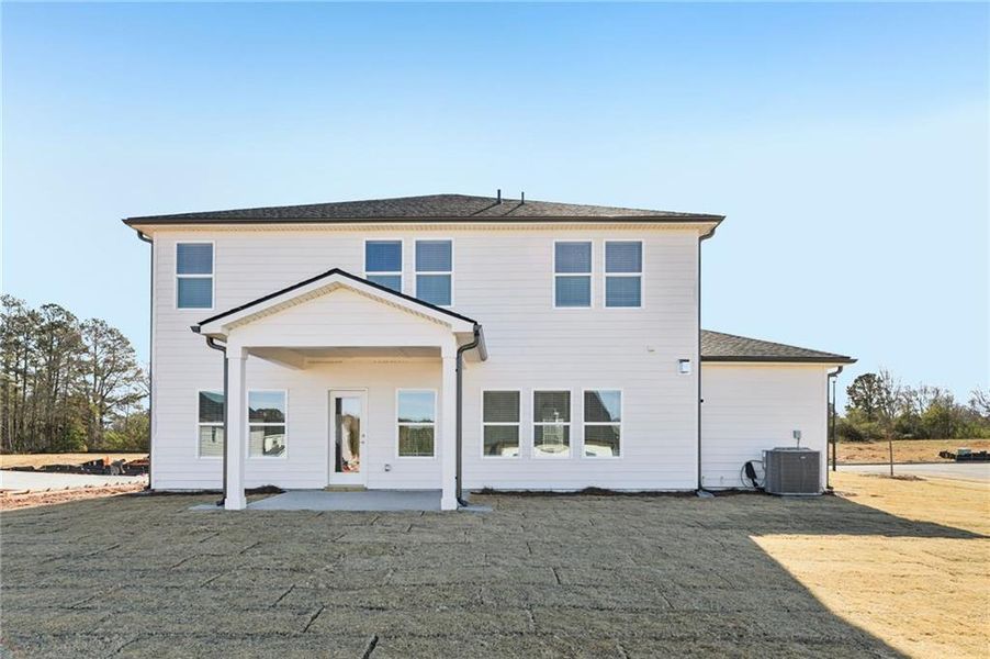 Exterior details and patio area of a home in River Pointe, Monroe (Image 26).