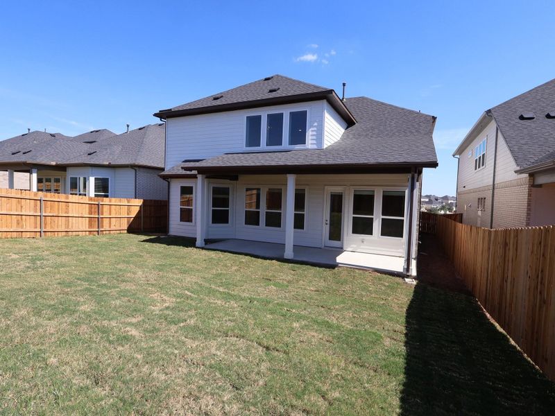 Exterior details and patio area of a home in Edgewood, Leander (Image 3). Exterior details and patio area of a home in Edgewood, Leander (Image 3).