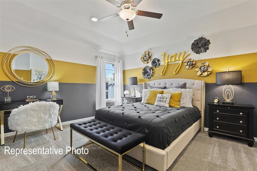 Spacious bedroom featuring vaulted ceilings, a ceiling fan with integrated lighting, window with white drapery, and neutral carpeting
