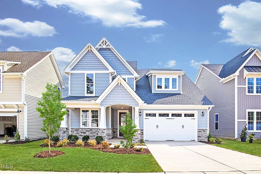 Representative exterior photo of a completed home built from the The Whitley by RobuckHomes in Windwater, Hampstead, NC (Image 27).