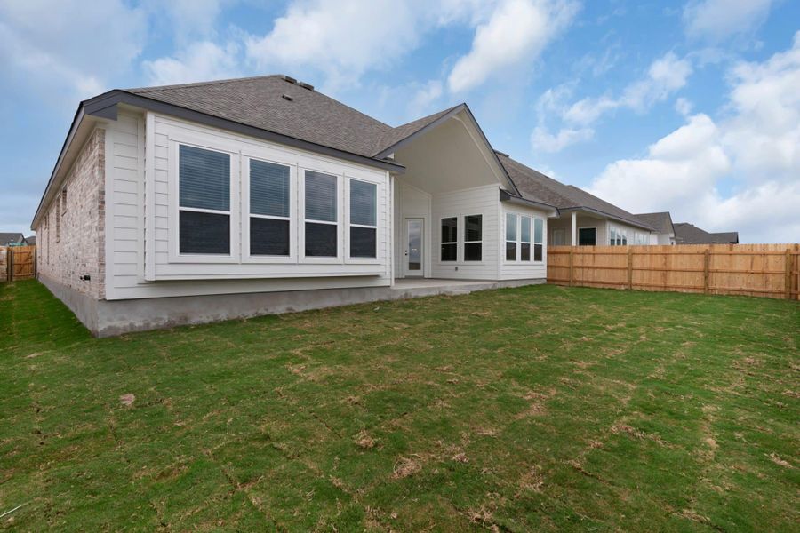 Exterior details and patio area of a home in The Grove at Blackhawk, Pflugerville (Image 29).