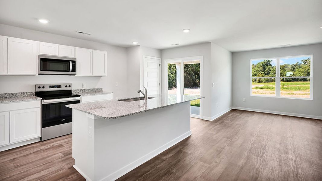 Furnished interior view inside a new home in Vineyard Trail, Jacksonville (Image 6).