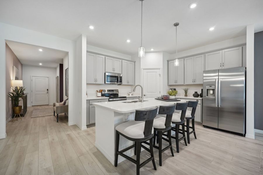 Kitchen with Sitting Area of The Webber at Country Club Estates