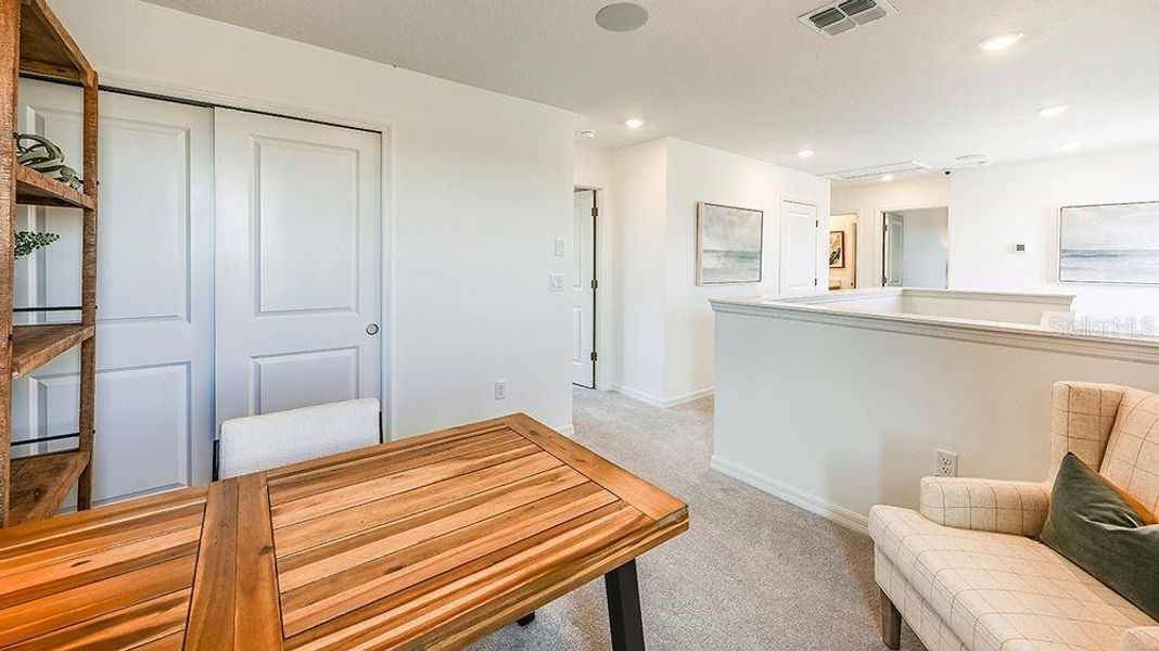 Furnished interior view inside a new home in Waterstone, Groveland (Image 11).