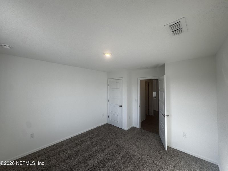 Spacious, unfurnished interior of a new home in The Arbors, Jacksonville (Image 26).