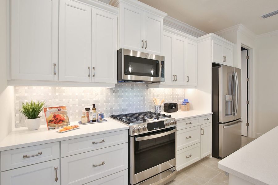 Representative furnished interior of a home built from the Sandcastle 2 by Neal Communities in Boca Royale Golf & Country Club at Wellen Park, Englewood (Image 9).