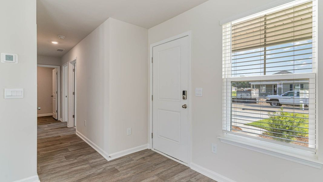 Representative unfurnished interior of a home built from the CURTIS by D.R. Horton in The Cottages at Blake Farm, Wilmington (Image 7). Representative unfurnished interior of a home built from the CURTIS by D.R. Horton in The Cottages at Blake Farm, Wilmington (Image 7).