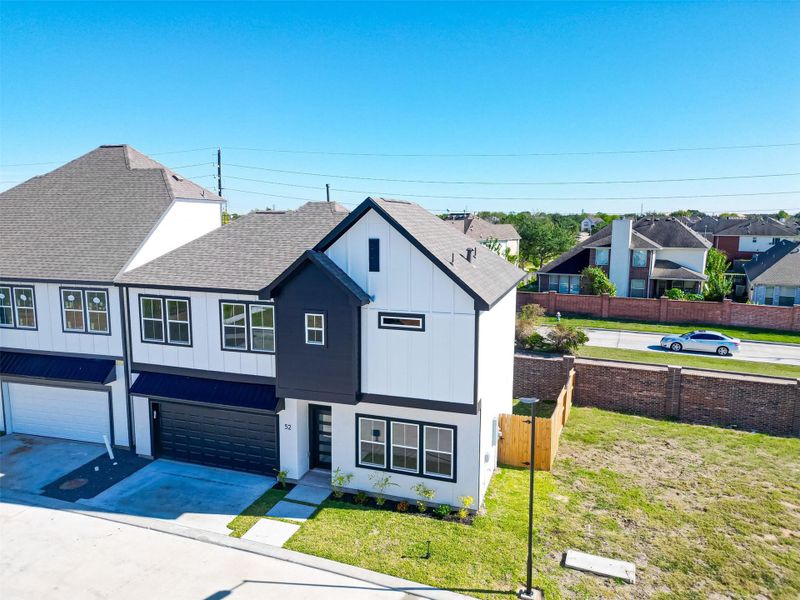 Front exterior of a new home in Metro Village, Houston, TX, highlighting curb appeal (Image 1). Front exterior of a new home in Metro Village, Houston, TX, highlighting curb appeal (Image 1).