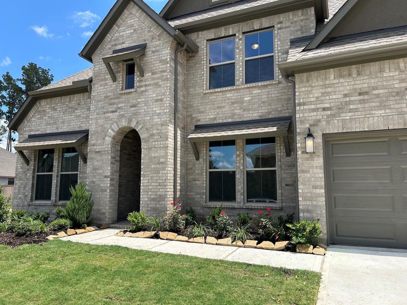 Exterior details and patio area of a home in The Highlands, Porter (Image 3).